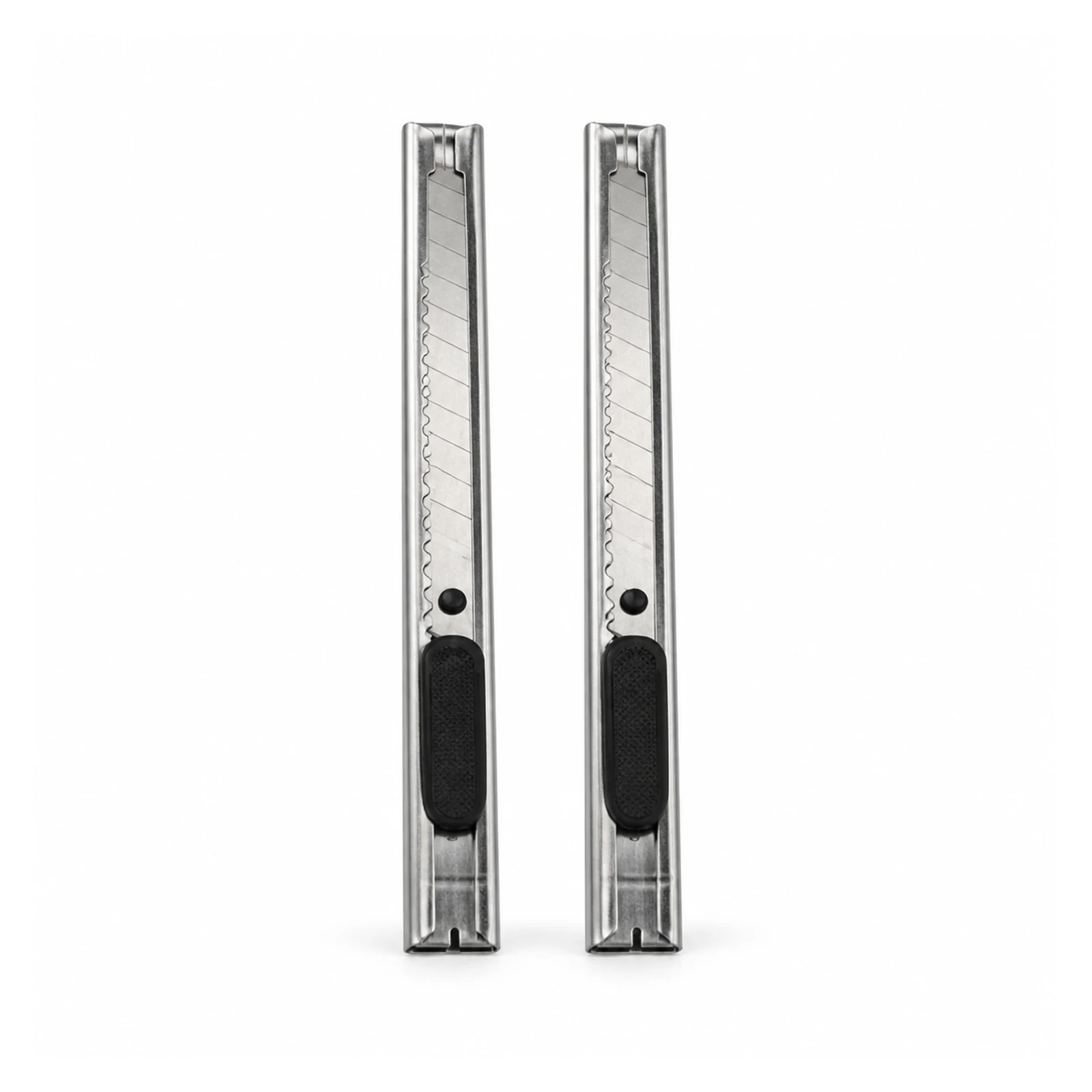 Set de dos cutters plateados de 9 mm con deslizador negro sobre fondo blanco, SKU 23651