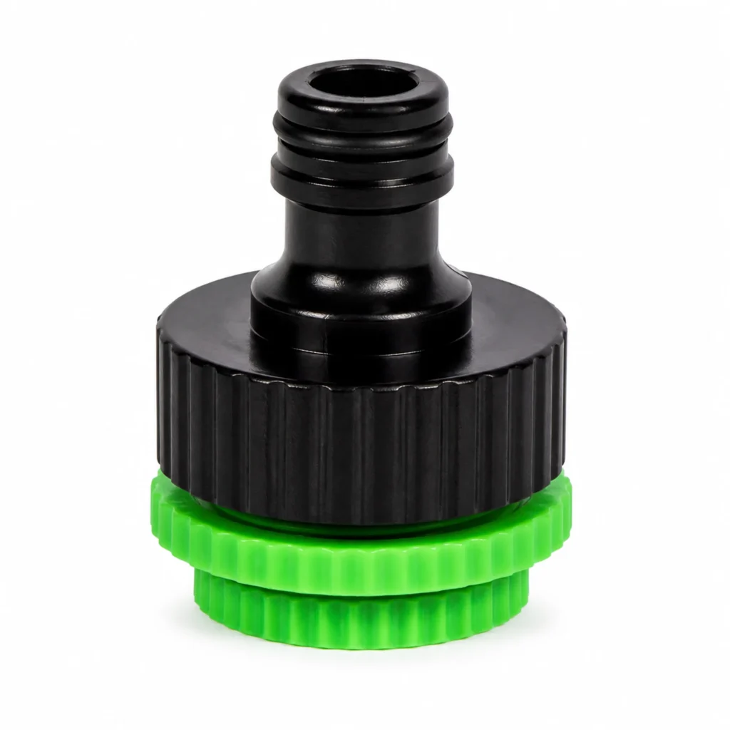 Adaptador universal negro y verde para grifos de tres medidas