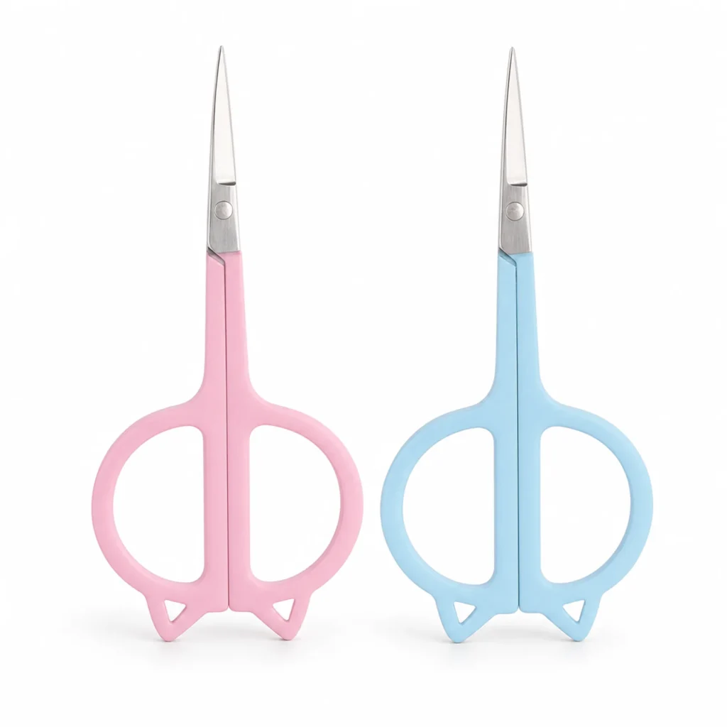 Tijeras de belleza con mango de gato en colores rosado y azul