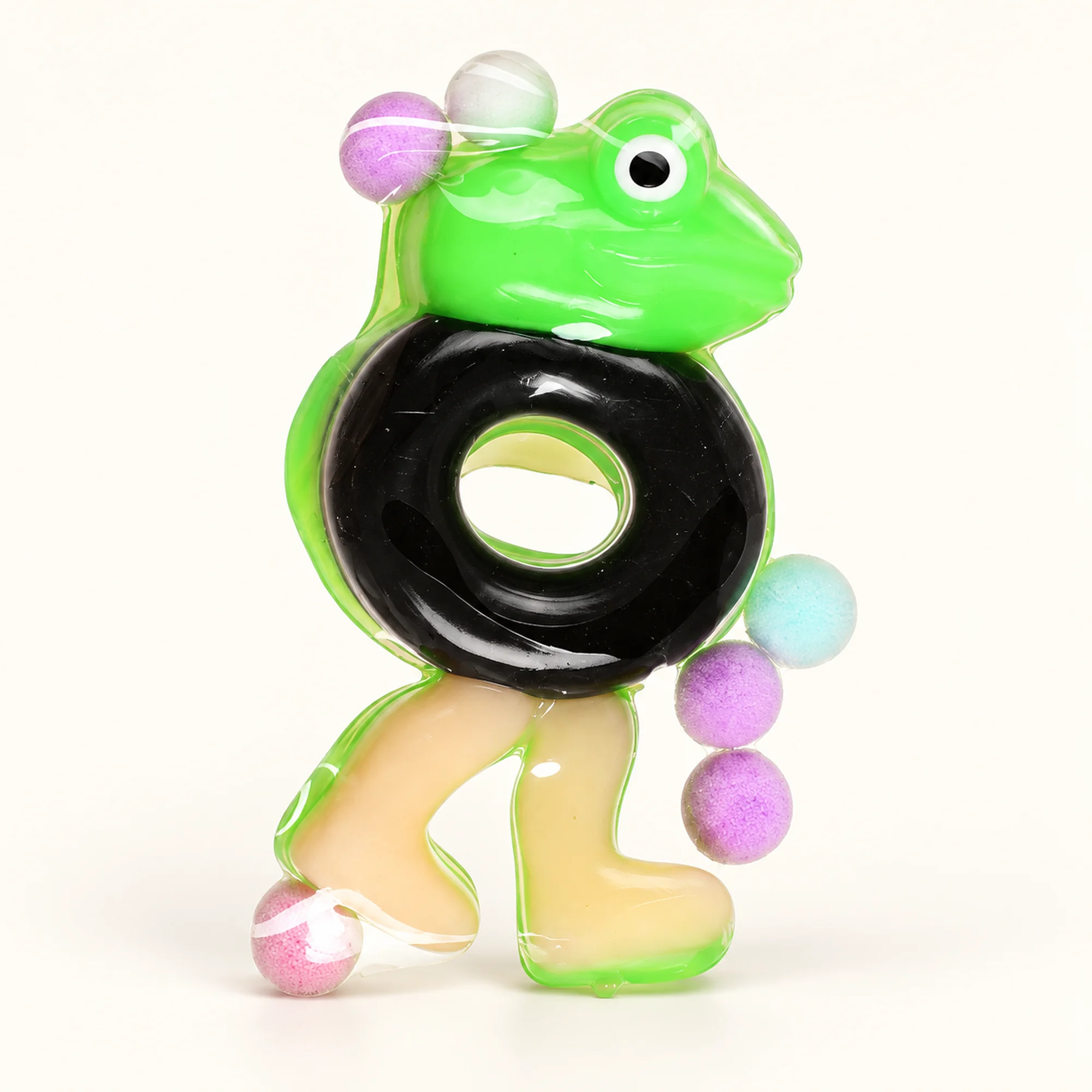 Juguete Antiestrés Rana con Neumático, Empaque 13 × 12,5 cm